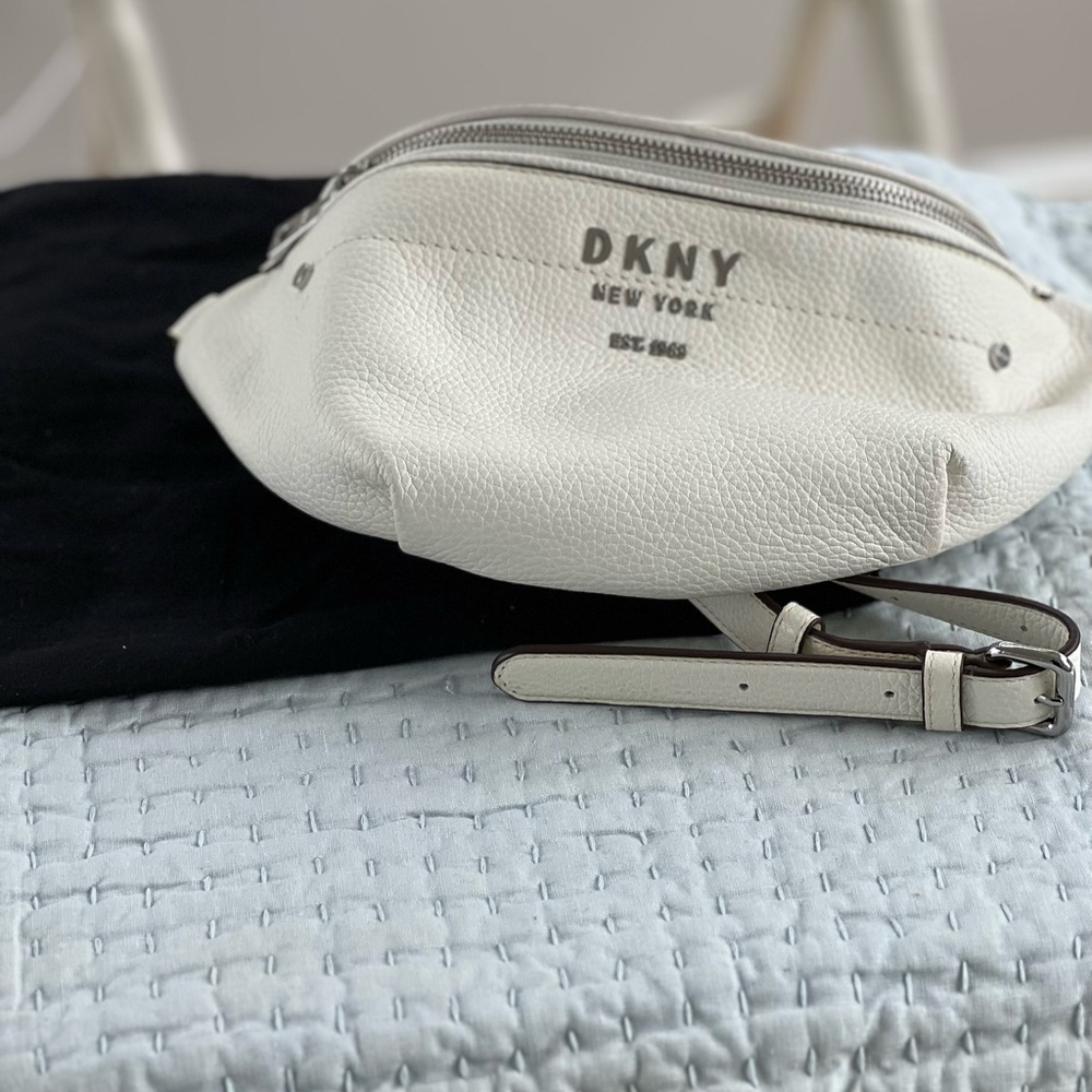 White DKNY belt or cross the body Thompson Belt Bag.